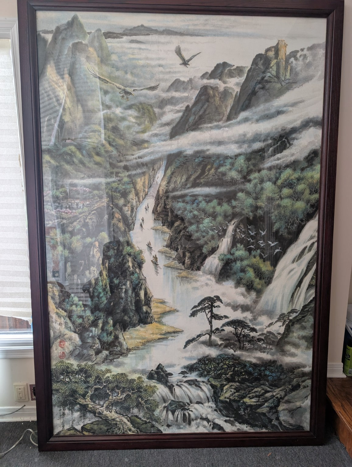 Framed hand-painted landscape with mountains, waterfalls and pine trees
