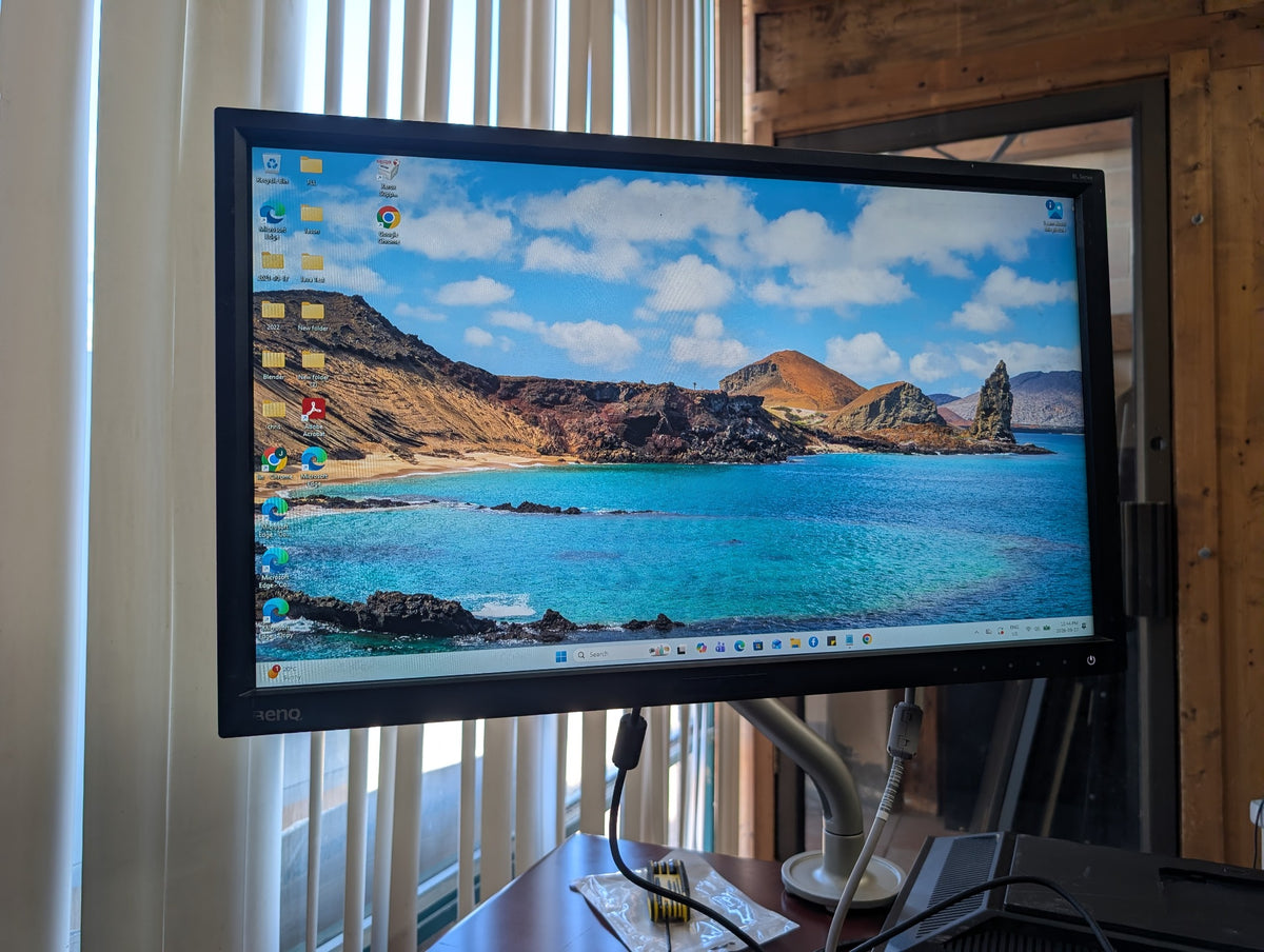 BenQ BL2423PT monitor with adjustable desk arm