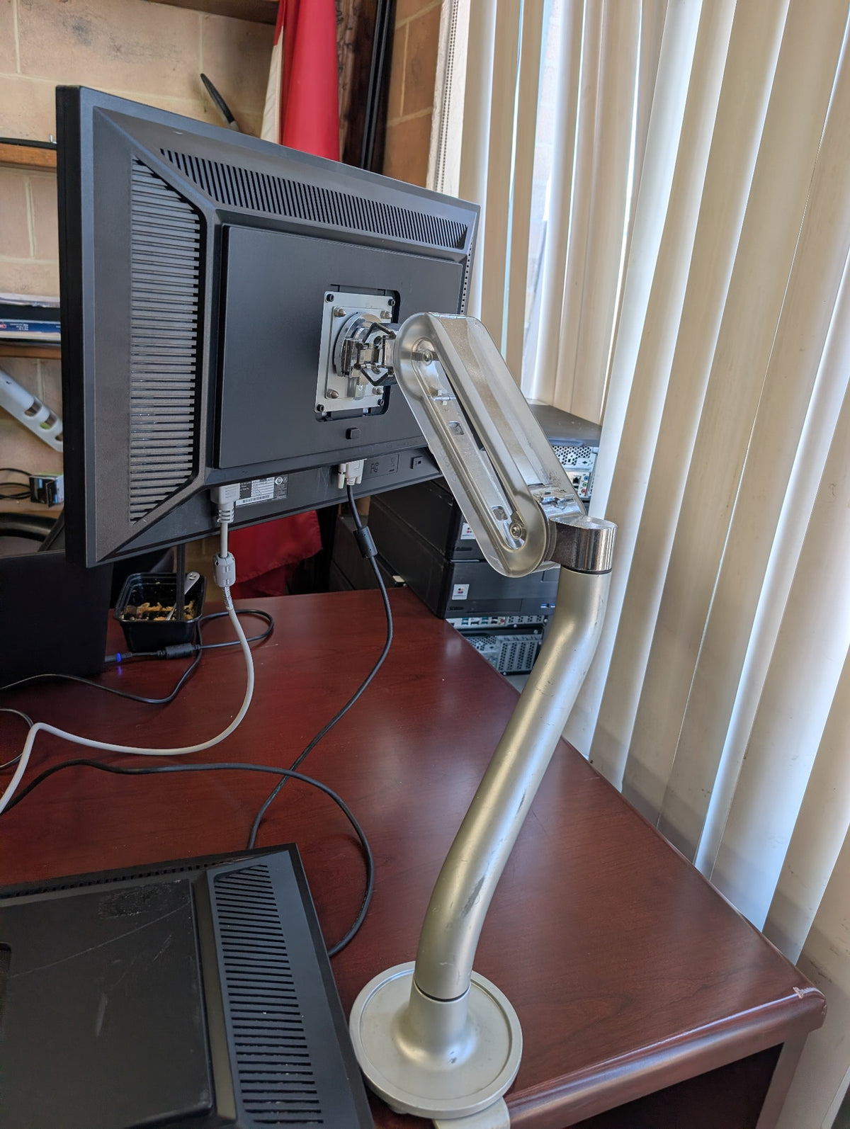 BenQ BL2423PT monitor with adjustable desk arm