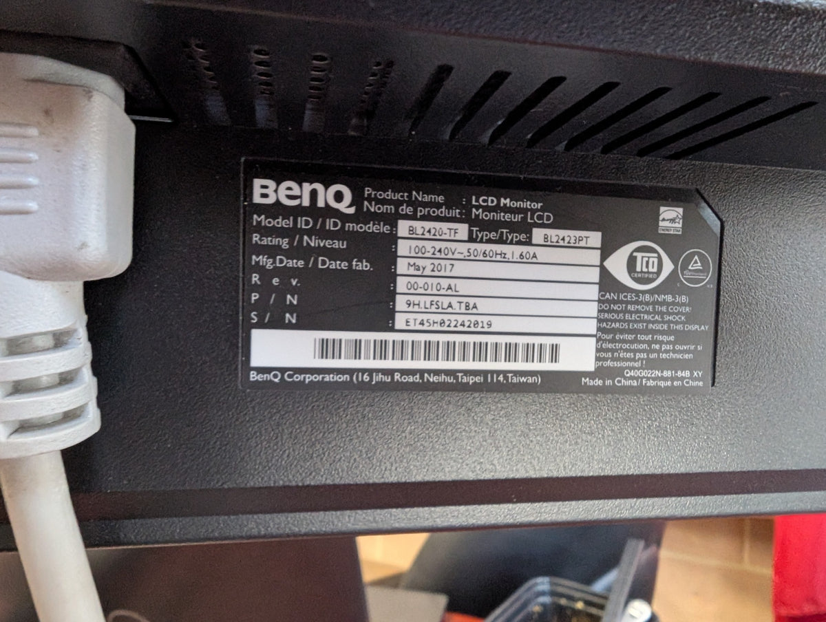 BenQ BL2423PT monitor with adjustable desk arm