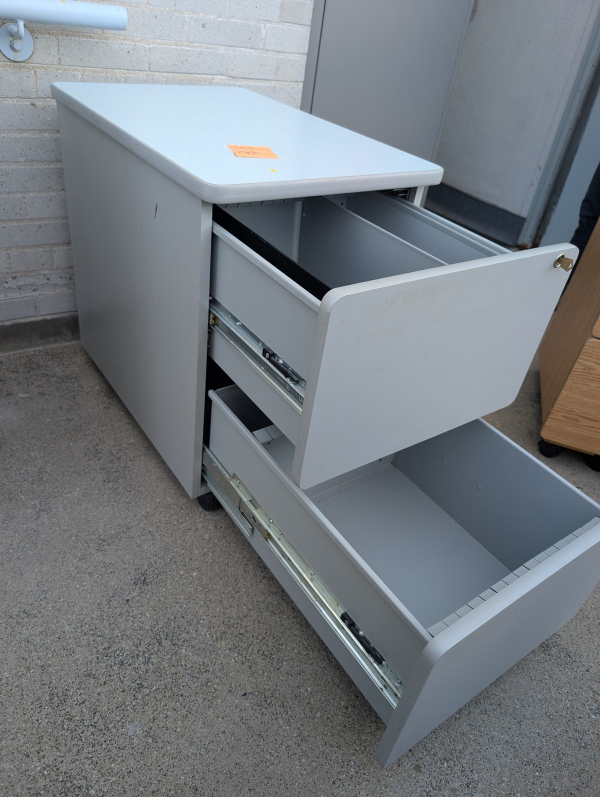 Grey two drawer mobile filing cabinet drawer detail