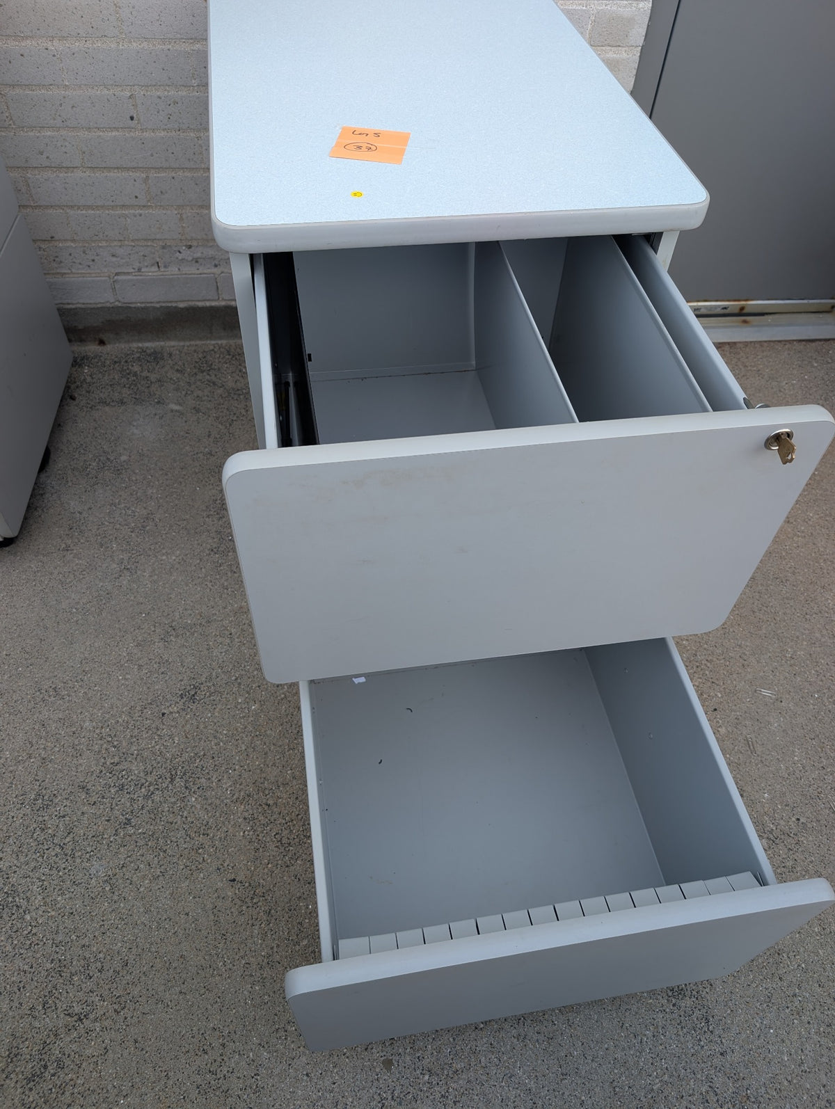 Grey two drawer mobile filing cabinet drawer detail