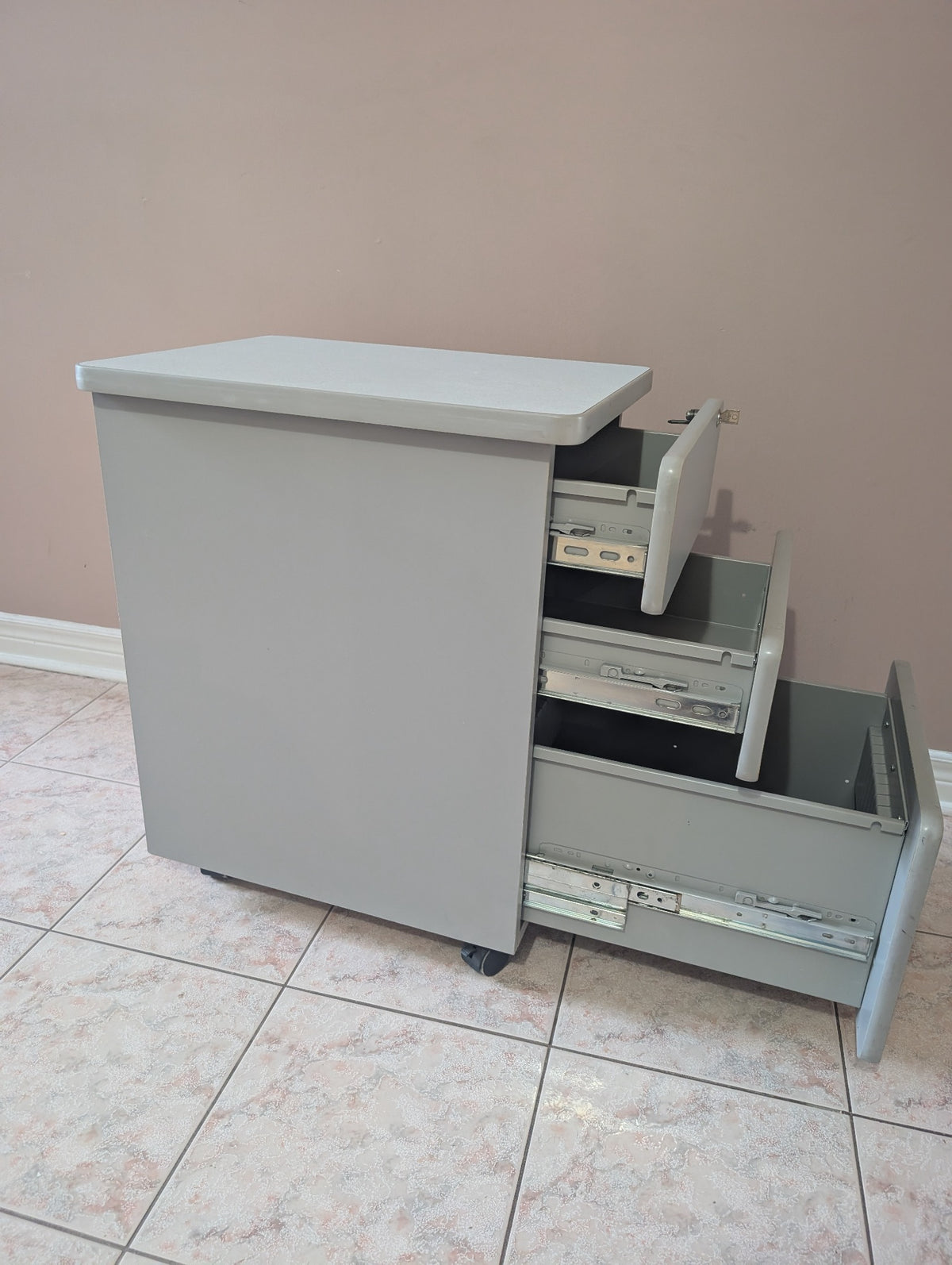 Grey filing cabinet drawer detail