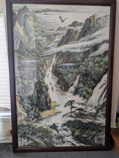 Framed hand-painted landscape with mountains, waterfalls and pine trees