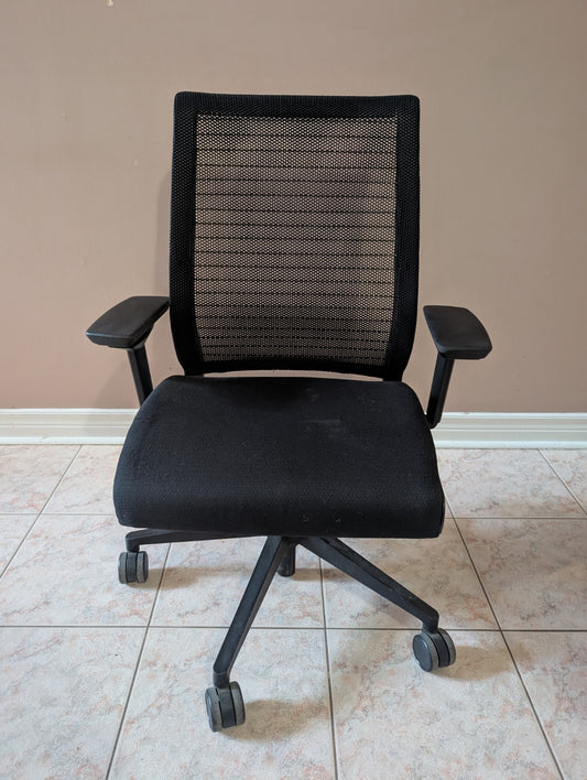 Black Steelcase Think 465 office chair, view 1
