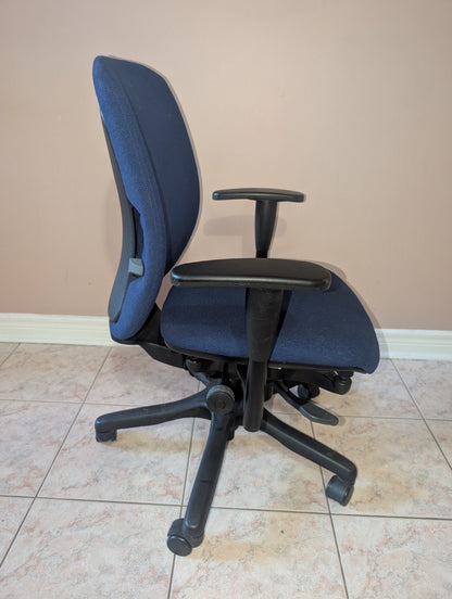 Blue Teknion Amicus fabric office chair, side view