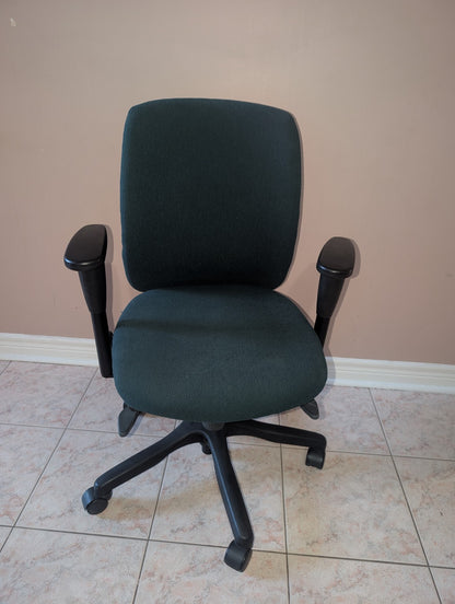 Dark green Teknion Amicus fabric office chair, front view