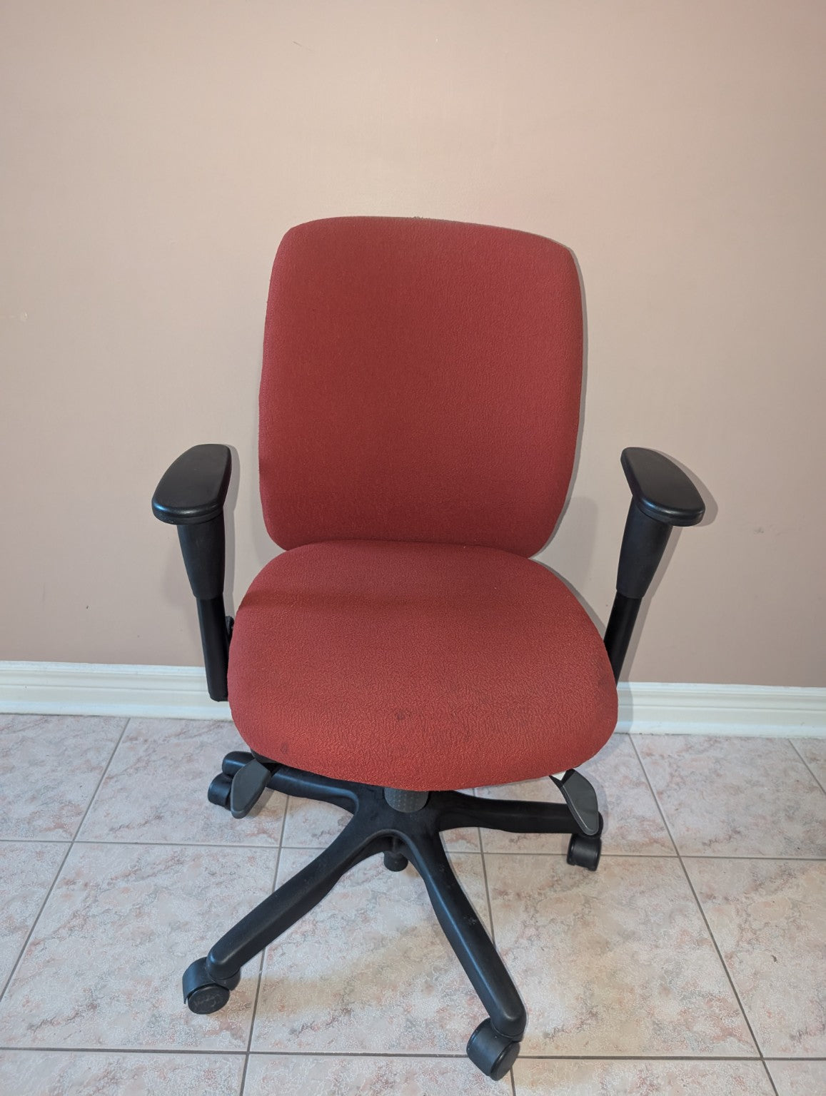 Red Teknion Amicus fabric office chair, front view