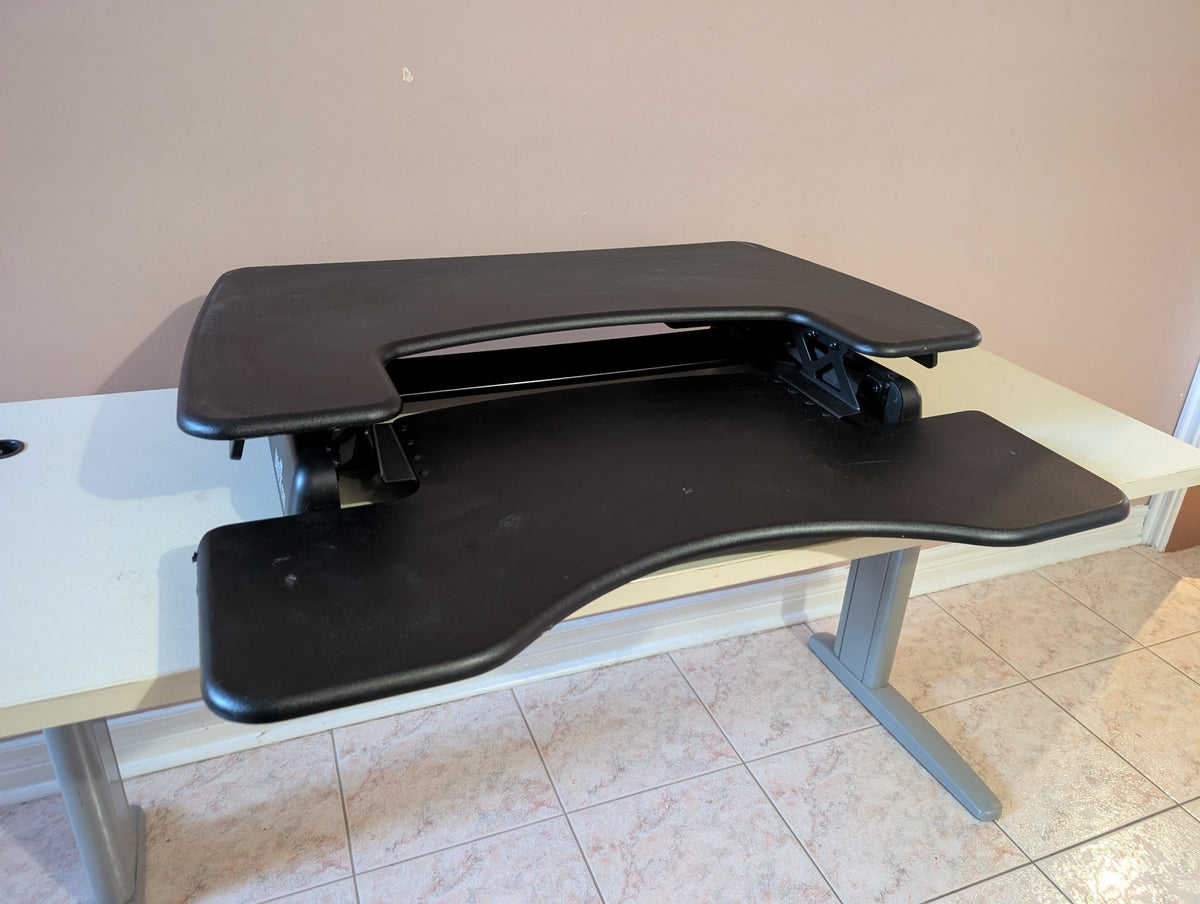 Black VARIDESK standing desk converter