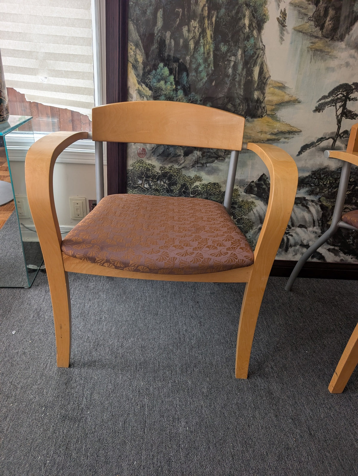 Wood arm guest chair with patterned upholstered seat, front view