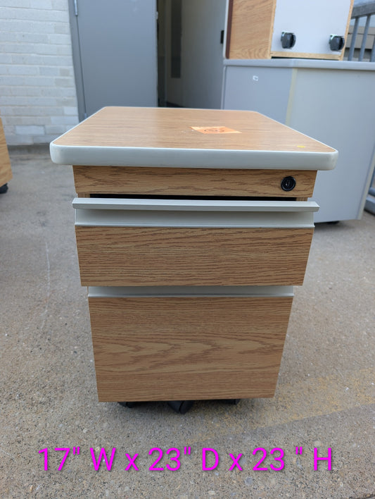 Front view of woodgrain filing cabinet, 17 inches wide by 23 inches deep by 23 inches high
